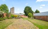 Lambs Lawn has a large enclosed garden which is very private. As well as an area of lawn and a wonderful outside table, there is a special play-area to amuse young children. - Thumbnail Image