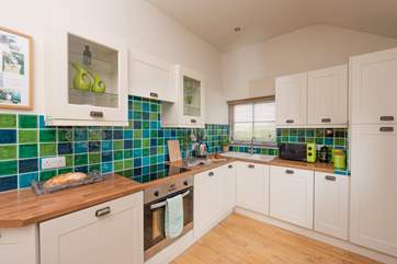 The stylish kitchen has all the equipment you'll need.