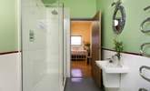 The bathroom has a bath and separate shower cubicle.  - Thumbnail Image