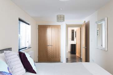 The bedroom has an en suite shower-room next door.