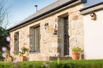 This lovely stone cottage once housed guests of the four-legged variety.