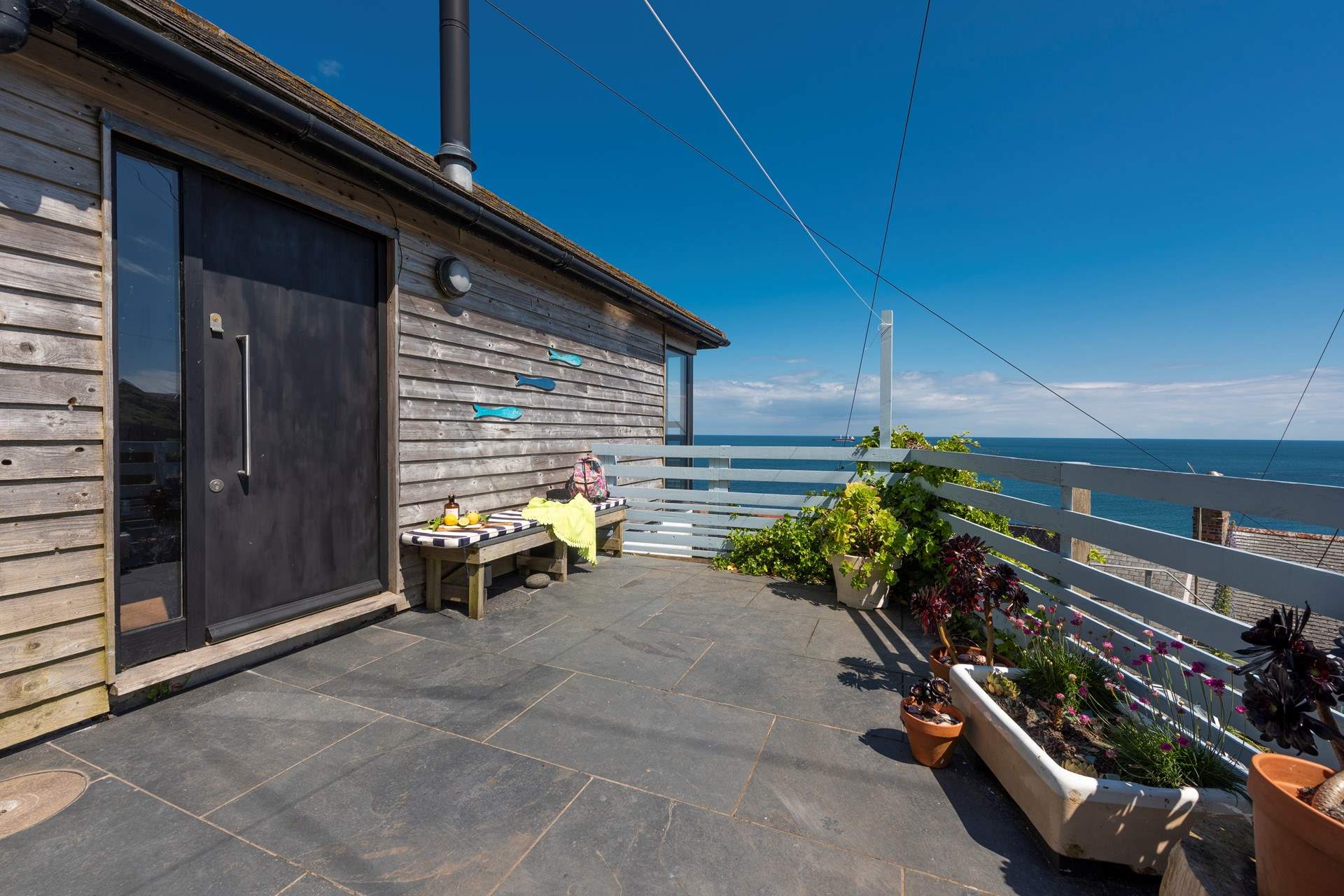 The secluded patio is the perfect place to relax from dawn until dusk. 