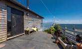 The secluded patio is the perfect place to relax from dawn until dusk.  - Thumbnail Image
