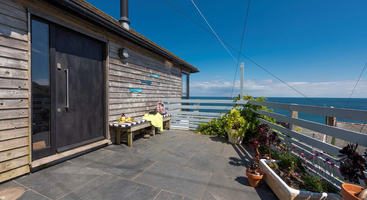 The secluded patio is the perfect place to relax from dawn until dusk. 