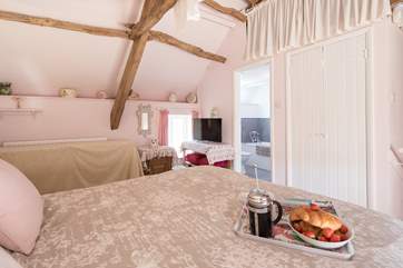 Leading off the bedroom is the en suite bathroom.