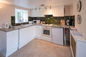 The well-equipped kitchen makes it easy to prepare that romantic meal for two.