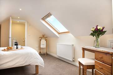 Leading off from the bedroom is a WC with wash-basin.