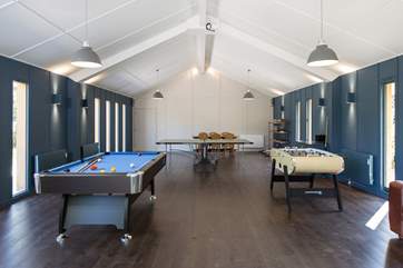 Complete with pool table, table-tennis and table-football.