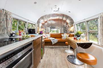 The kitchen has an oven and hob, making sure you can cook up a treat in this fabulous airstream.