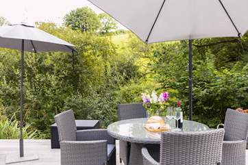 Dine al fresco in the sun on your private decking area (a glass balustrade around the decking is being added).