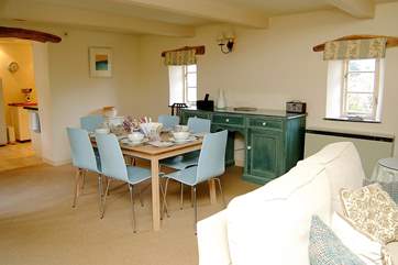 The colour palette in Medlar Cottage (2595) is soft creams, blues and white.