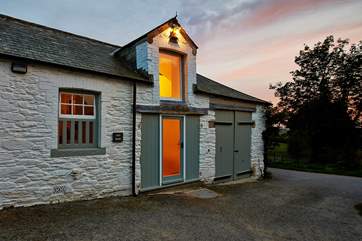 The outside of Hay Barn (2597) with the sun slowly setting in the west.