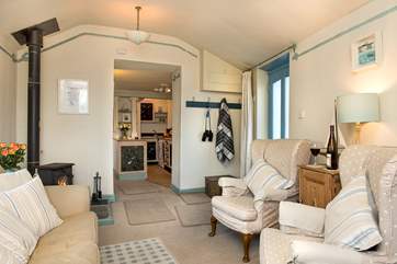 The comfortable sitting-area is wonderfully light and airy.