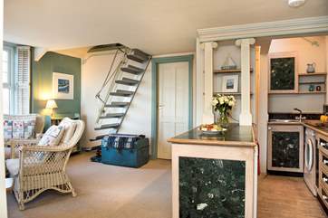 The dining-area is conveniently situated next to the kitchen.