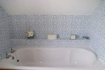 The en suite bathroom is ideal for young families.