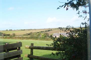 From the patio doors of the kitchen/dining-room there are countryside views.