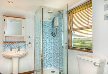 The separate shower in the en suite bathroom, cleverly fitted under the sloping ceiling.