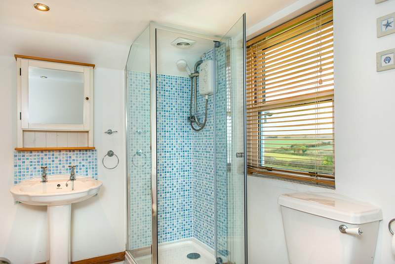 The separate shower in the en suite bathroom, cleverly fitted under the sloping ceiling.