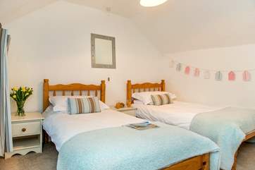 The pretty twin bedded room.