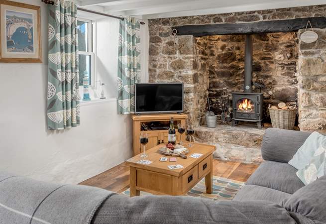 Snuggle down with a tasty glass of wine in front of the roaring wood burner.