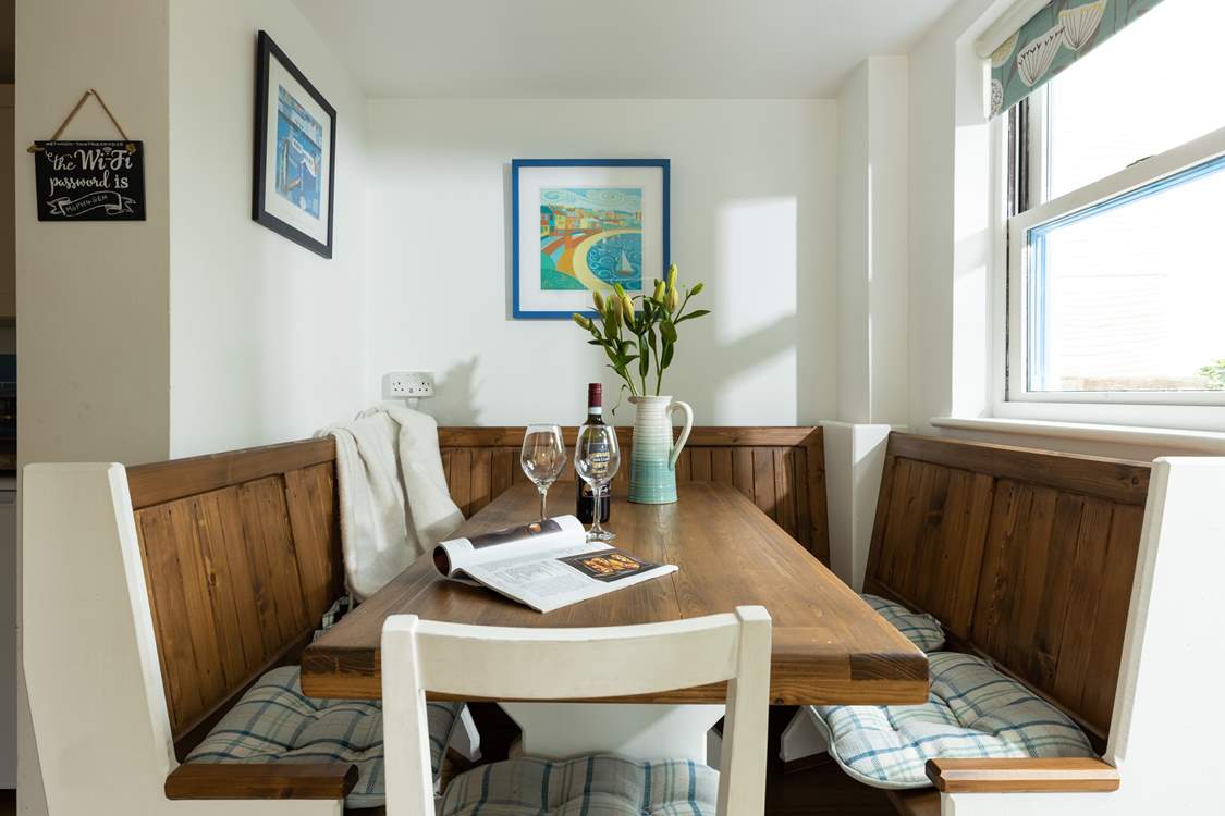 Gather round the dining-table to chat about the adventures of the day.