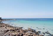 The beautiful beach at Sennen Cove (not the view from the property).