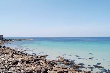 The beautiful beach at Sennen Cove (not the view from the property).