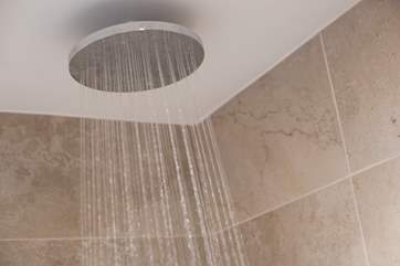 The bathroom has a fitted shower.