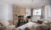 Cosy up in the sitting-room and light the wood-burner on chillier days.  - Thumbnail Image