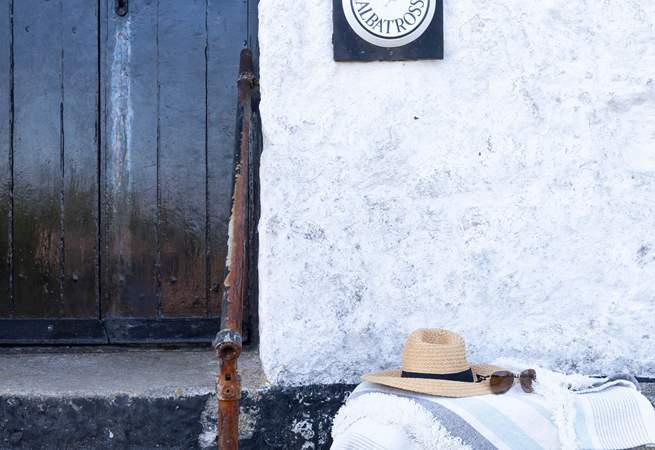 Granite steps lead to this traditional cottage.