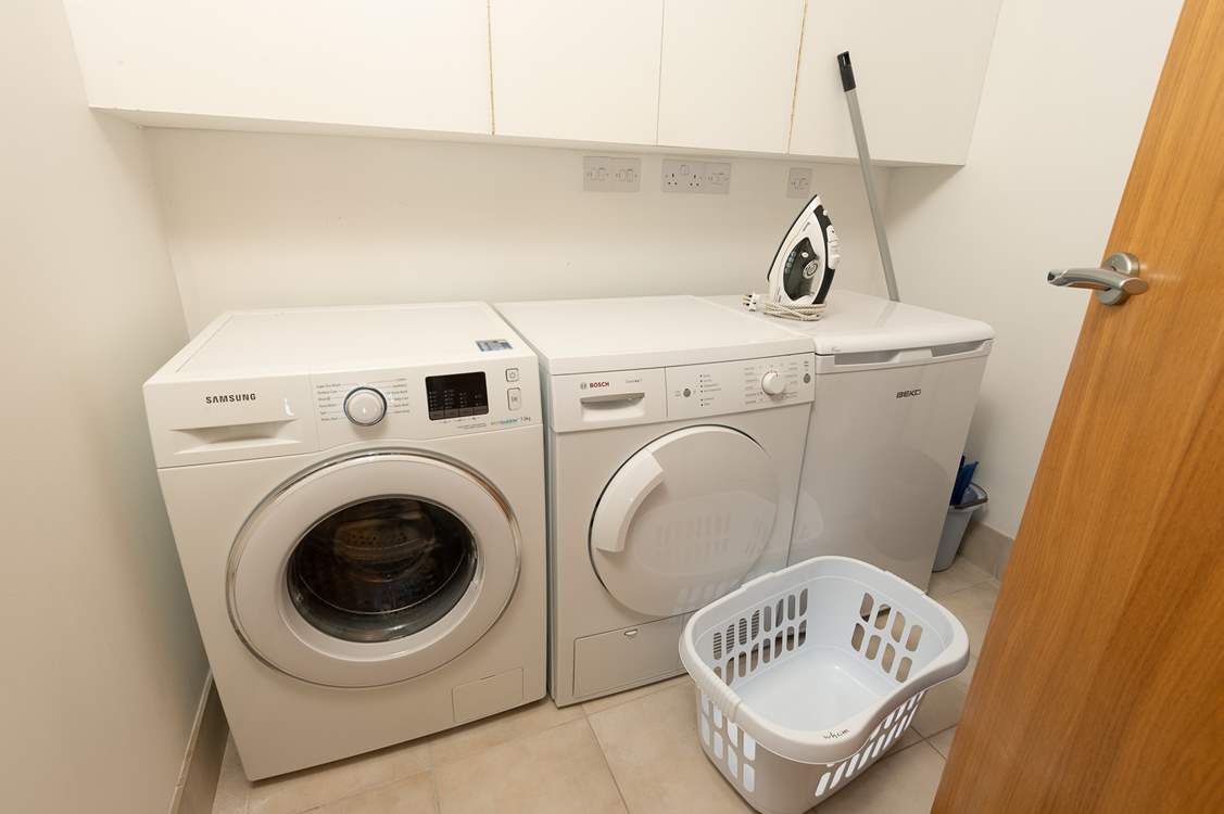 This is the utility-room off the kitchen. A practical space to make life easy.