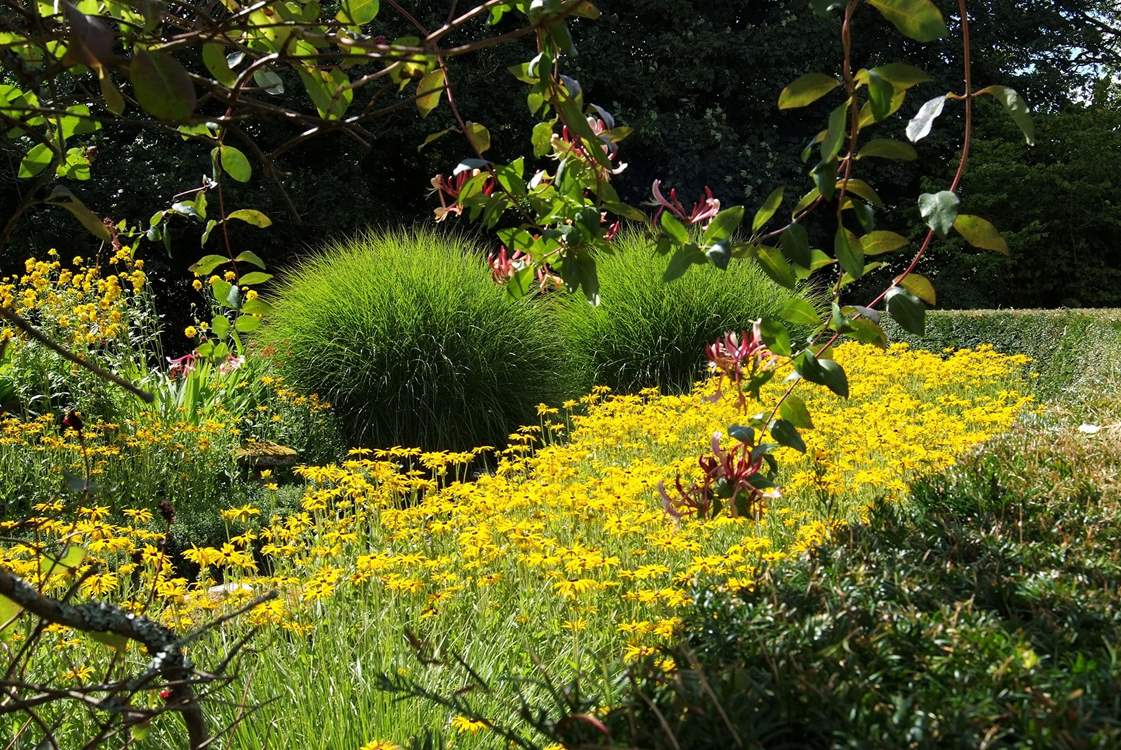 The garden flowers are beautiful throughout the spring and summer.