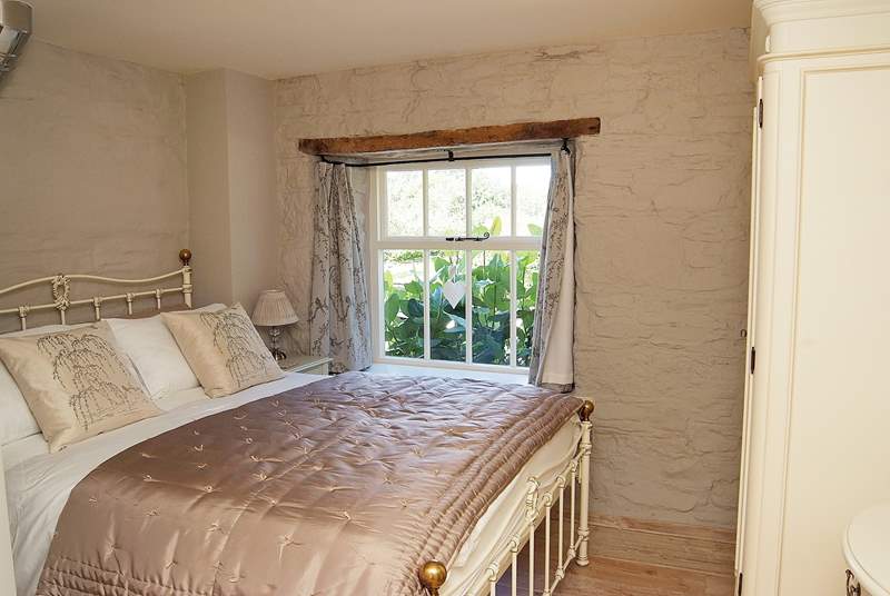 The double bedroom in the mill is beautifully furnished.
