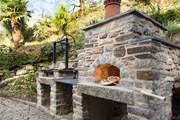 You even have you own outdoor pizza oven and barbecue area.