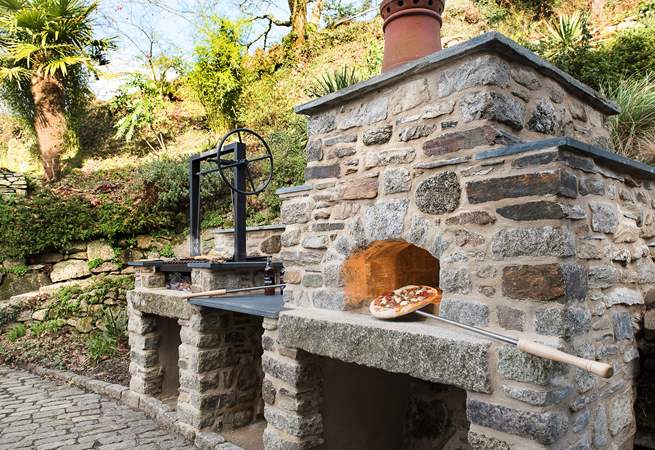 You even have you own outdoor pizza oven and barbecue area.