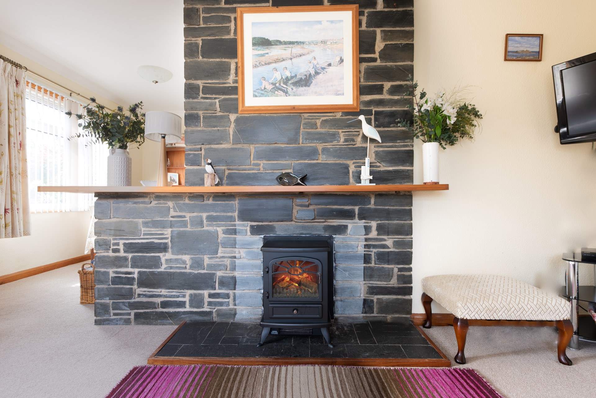 Cosy up by the electric stove.