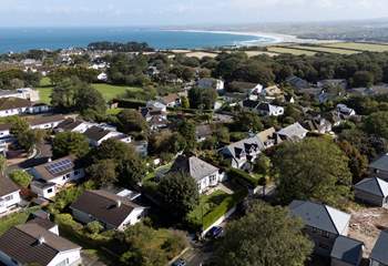 An aerial shot of the outstanding coastline in Carbis Bay, Trevail is the second bungalow on the left at the bottom of this picture.