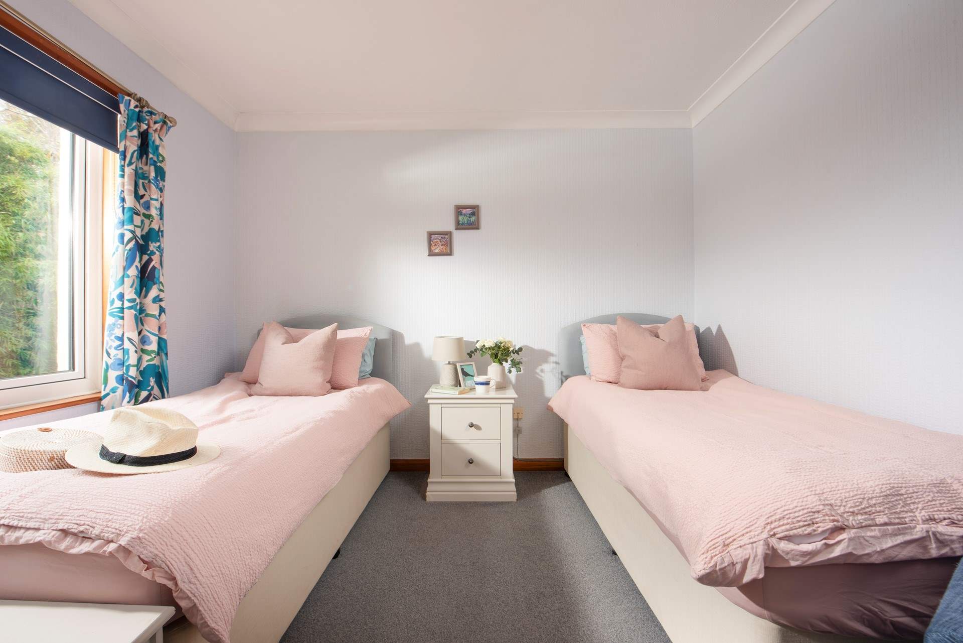 The sweet twin room overlooks the garden.