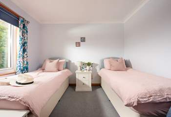 The sweet twin room overlooks the garden.