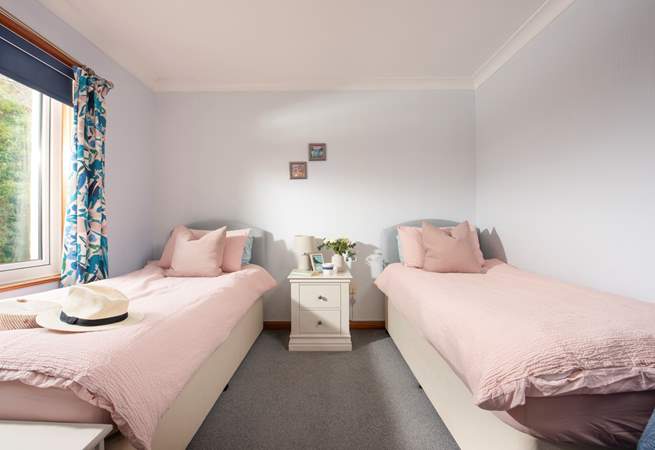 The sweet twin room overlooks the garden.