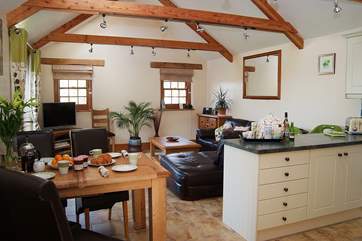 The open plan living-room is light, spacious and very welcoming.