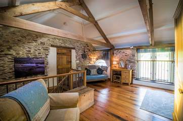 The stairs lead from the living-area, directly into bedroom 2.