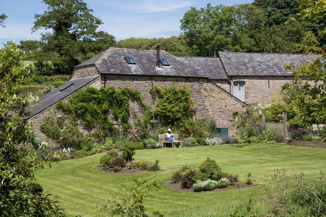 Looking back at Leigh Barn from the furthest point in the garden. You can just sneak a peek of the resident gardener's house to the right.