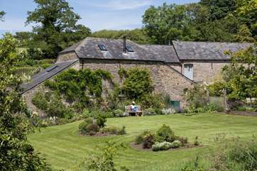 Looking back at Leigh Barn from the furthest point in the garden. You can just sneak a peek of the resident gardener's house to the right.