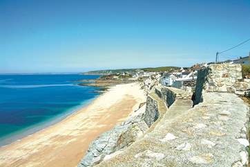 Porthleven Sands, the long beach to the east of the harbour. There are strong undercurrents and submerged rocks which make swimming inadvisable, though popular with experienced surfers.