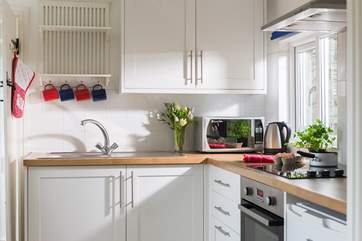 The small but well-equipped kitchen.