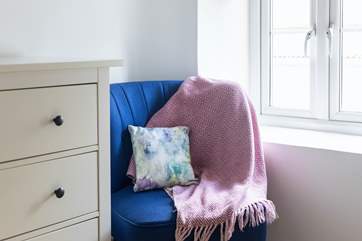 Cosy up on the chair with a good book.
