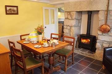 The dining-room, a cosy and comfortable space any time of year and located just off the kitchen.