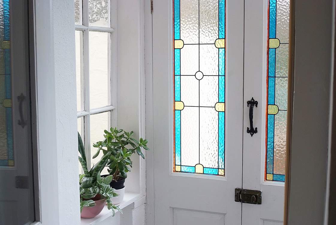 The porch to the front of Church Cottage with pretty glass panels.