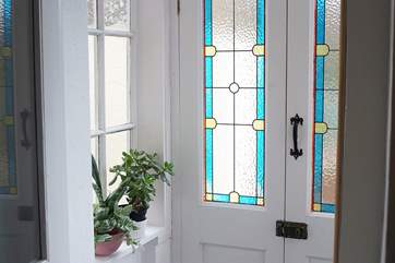 The porch to the front of Church Cottage with pretty glass panels.